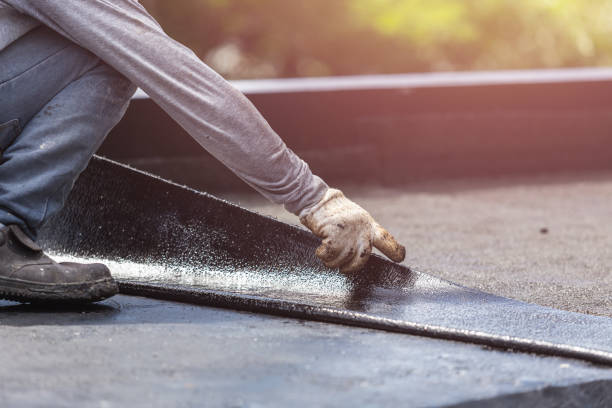 Professional Emergency Waterproofing technician working in Greensburg, KY